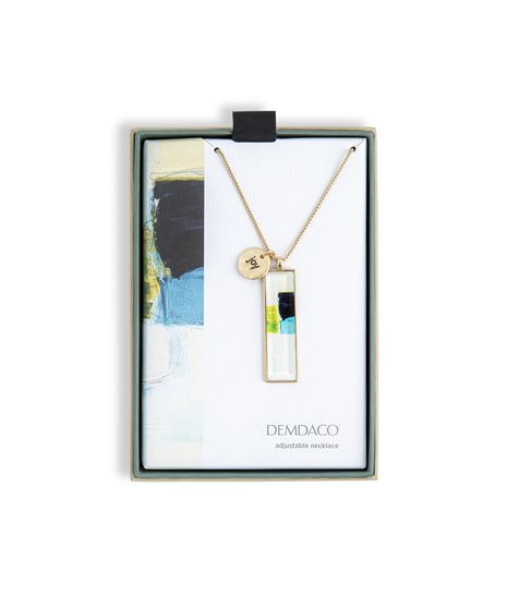 green, blue, black, and white modern gold-toned necklace with joy charm
