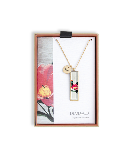 camellia flower, gold toned necklace with love charm