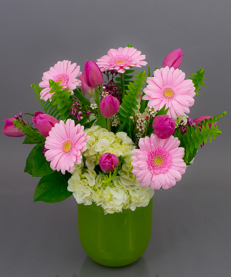 We will take our most beautiful roses, tulips, gerbera daisies, hydrangea, and cymbidium orchids and create a masterpiece in a soft color pallette. 