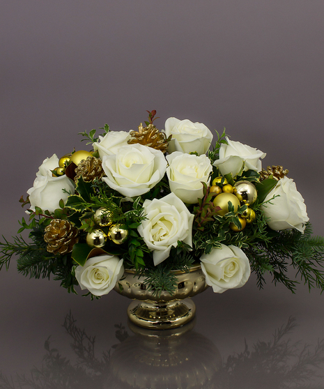 The Biltmore centerpiece will be the talk of the party with it's beautiful gold container, elegant white roses and beautiful seasonal evergreens.