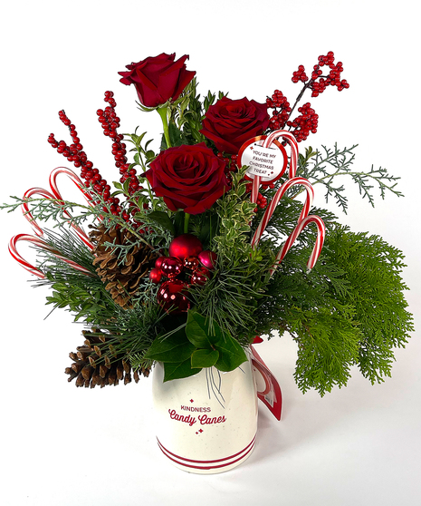 candy cane themed floral arrangement