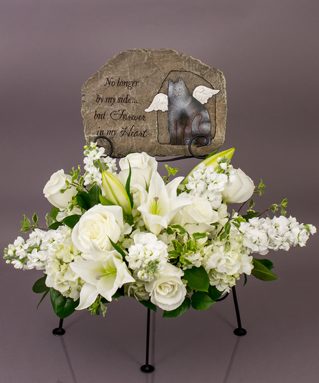 We will create a beautiful floral floral arrangement to celebrate a loved one and display your selected memorial plaque above it in our display stand.
