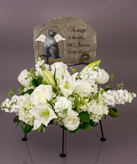 We will create a beautiful floral floral arrangement to celebrate a loved one and display your selected memorial plaque above it in our display stand.