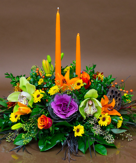 We will combine a beautiful collection of fresh seasonal flowers and candles for a truly stunning centerpiece.