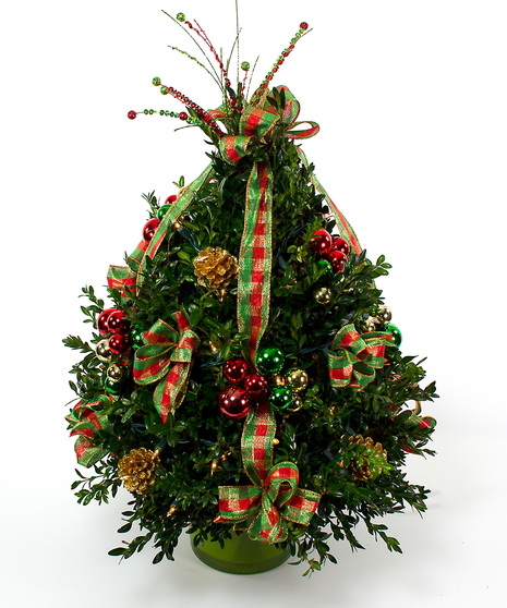 We've taken the finest premium boxwood tips from Virginia and designed a beautiful boxwood tree, then trimmed it with lights and beautiful ribbons, cones and ball clusters.