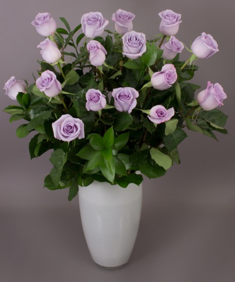 Lavender roses are so soft and gentle. We chose them because of their consistent lavender color.