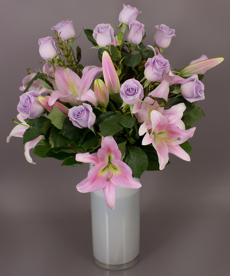 Lavender roses are so soft and gentle. We chose them because of their consistent lavender color.