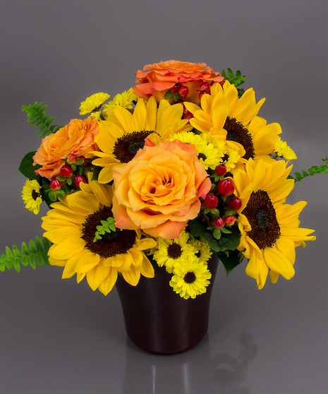 We've tried to capture that radiance using bright sunflowers and seasonal 