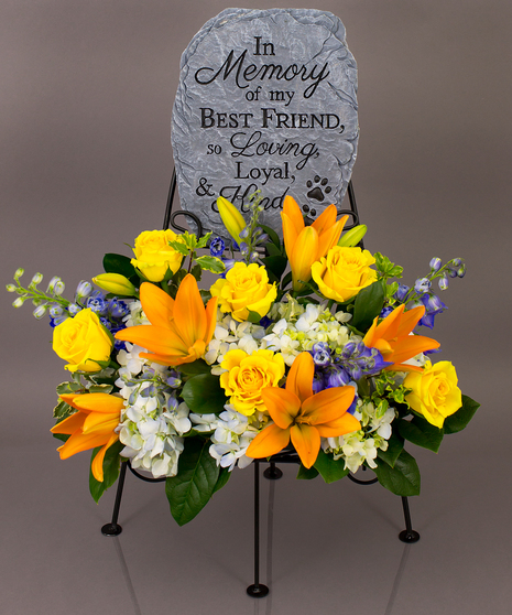 We will create a beautiful floral floral arrangement to celebrate a loved one and display your selected memorial plaque above it in our display stand.