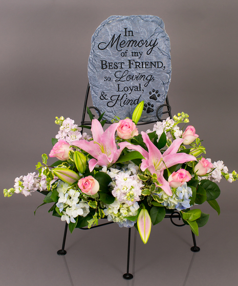 We will create a beautiful floral floral arrangement to celebrate a loved one and display your selected memorial plaque above it in our display stand.