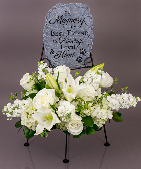 We will create a beautiful floral floral arrangement to celebrate a loved one and display your selected memorial plaque above it in our display stand.