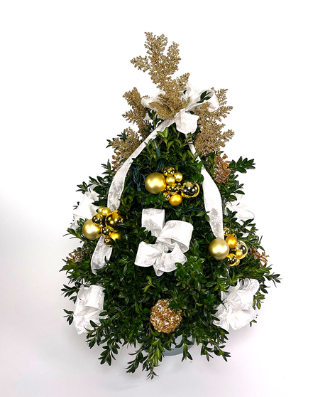We've taken the finest premium boxwood tips from Virginia and designed a beautiful boxwood tree, then trimmed it with lights and beautiful ribbons, cones and ball clusters.